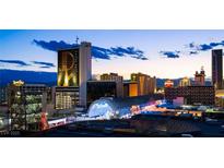 Striking city view of Las Vegas buildings and architecture with beautiful evening sky and light at 150 Las Vegas Blvd # 1507, Las Vegas, NV 89101