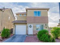 Charming two-story home with a well-maintained front yard and inviting entrance at 4195 Story Rock St, Las Vegas, NV 89115