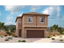Charming two-story home with a two-car garage and low maintenance landscaping, perfect for modern living at 1026 Ferodale Ave, North Las Vegas, NV 89084