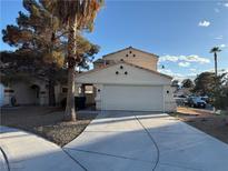 Charming two-story home featuring a spacious two-car garage and well-maintained landscaping at 2821 Willow Wind Ct, Las Vegas, NV 89117