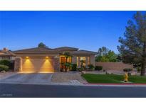 Charming single-story home with a two-car garage and well-maintained landscaping at 3 Chatmoss Rd, Henderson, NV 89052