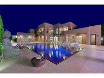 Stunning modern home featuring a luxurious pool and spa for ultimate relaxation and enjoyment at 3740 Caesars Cir, Las Vegas, NV 89120