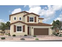Charming two-story home featuring a tile roof, brown shutters, and a convenient two-car garage at 4349 S Angel Falls Ct, Pahrump, NV 89061