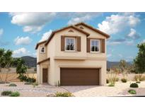 Two-story home with shutters, desert landscaping, and a two car garage provides a welcoming exterior at 7214 Banksia St, North Las Vegas, NV 89084