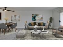 Bright living room with neutral tones, modern decor, and stylish furnishings at 8070 W Russell Rd # 2026, Las Vegas, NV 89113