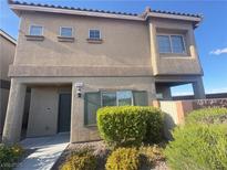 Charming two-story home with a well-maintained front yard and stucco facade at 9138 Hermosa Valley St, Las Vegas, NV 89178
