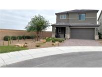 Charming two-story home with desert landscaping and a covered porch at 929 Hunter Shores Ave, North Las Vegas, NV 89084