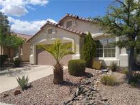 Charming single-story home with desert landscaping and a two-car garage in a sunny neighborhood at 2148 Hidden Ranch Ter, Henderson, NV 89052