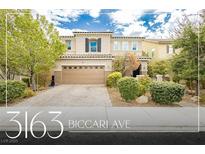 Charming two-story home featuring a two-car garage and a beautifully landscaped front yard at 3163 Biccari Ave, Henderson, NV 89044