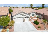 Charming single-story home featuring a two-car garage and well-manicured landscaping at 3278 Turning Bridge St, Las Vegas, NV 89135