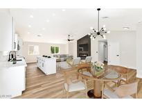Bright and airy living room features a modern fireplace and open layout at 811 Spyglass Ln, Las Vegas, NV 89107