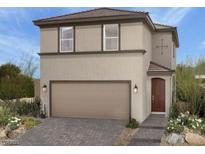 Charming two-story home featuring a two-car garage, a welcoming entryway, and low maintenance landscaping at 10029 Luna River Ave, Las Vegas, NV 89148