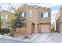 Charming two-story home with a well-maintained yard and covered entry in a residential neighborhood at 4129 Chamisa Cove St, Las Vegas, NV 89115