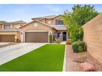 Charming two-story home featuring a well-manicured lawn, covered entry, and a two-car garage at 7013 Bisoni St, Las Vegas, NV 89149