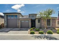 Charming single-story home with a three-car garage and desert landscaping at 9638 Smiley Creek St, Las Vegas, NV 89178