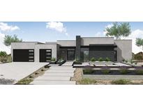 Contemporary home featuring a modern design, sleek lines, and a well-manicured desert landscape at 1040 Wavehugger Dr, Henderson, NV 89002
