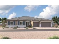 Charming single-story home featuring a neutral color palette, stone accents, and a two-car garage at 5411 Meranto Ave, Las Vegas, NV 89139