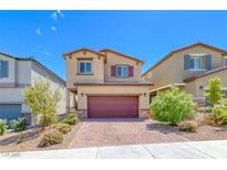 Charming two-story home with landscaped yard and brick driveway in a suburban neighborhood at 10979 Bristol Park Ave, Las Vegas, NV 89166