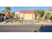 Charming one-story home with desert landscaping and attached two-car garage at 2380 Sierra Sunrise St, Las Vegas, NV 89156