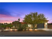 Charming single-story home featuring a well-manicured front yard and attached two-car garage at 4185 W Arby Ave, Las Vegas, NV 89118