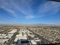 Expansive aerial view showcasing the city skyline and distant mountains, promoting the scenic location at 4381 W Flamingo Rd # 3109, Las Vegas, NV 89103