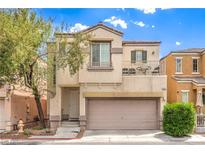 Charming two-story home featuring a balcony, attached garage, and well-maintained landscaping at 6623 Hurkling Stone Ave, Las Vegas, NV 89139