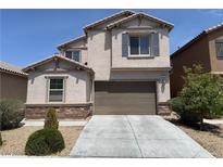 Charming two-story home with a two-car garage and well-maintained landscaping at 7246 Spring Flower Ave, Las Vegas, NV 89117