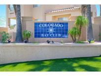 Inviting Colorado Bay Club community sign surrounded by desert landscaping and palm trees at 2240 Highpointe Dr # 203, Laughlin, NV 89029