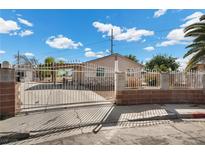 Charming home with secure gated entrance and covered carport at 2821 Geist Cir, Las Vegas, NV 89115