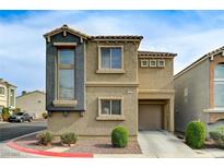 Charming two-story home with desert landscaping and attached one car garage at 5228 Fire Night Ave, Las Vegas, NV 89122