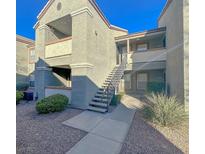 Exterior view of the condo showing the entry stairs at 555 E Silverado Ranch Blvd # 2028, Las Vegas, NV 89183