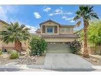 Charming two-story home featuring desert landscaping, a two-car garage, and mature palm trees at 10519 Bella Camrosa Dr, Las Vegas, NV 89141
