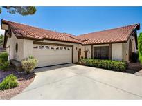 Charming single-story home with well-manicured landscaping and a spacious two-car garage at 3987 Saddlewood Ct, Las Vegas, NV 89121
