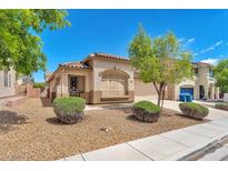 Charming single-story home with well-maintained front yard and desert landscaping on a bright day at 9588 Comiskey Ct, Las Vegas, NV 89148