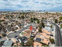 Expansive aerial view of neighborhood and 7268 Wichita Ct with mature landscaping near the Las Vegas strip at 7268 Wichita Ct, Las Vegas, NV 89119