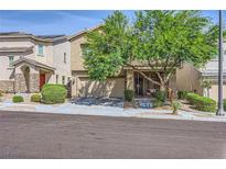 Charming two-story home with a two-car garage and well-maintained landscaping at 8091 Mosaic Sunrise Ln, Las Vegas, NV 89166