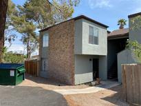 Exterior view of a multi-Gathering residential building with a combination of brick and stucco facade at , Las Vegas, NV 89119