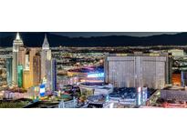 Striking cityscape view showcasing the vibrant lights and iconic architecture of Las Vegas at night at 145 E Harmon Ave # 3807, Las Vegas, NV 89109
