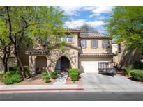 Charming two-story home with well-manicured landscaping and a two-car garage, located in a quiet neighborhood at 3367 Popcorn Flower St, Las Vegas, NV 89117