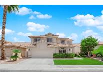 Charming two-story home featuring desert landscaping, tile roof and an attached two-car garage at 3846 Biltmore Bay St, Las Vegas, NV 89147