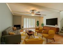 Bright living room features hardwood floors, fireplace, and lots of natural light at 516 Delfern Ln, Las Vegas, NV 89169