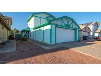 Charming single-Gathering home featuring a two-car garage and well-kept lawn in a neighborhood setting at 553 Dutchman Ave, Henderson, NV 89011
