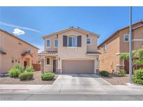 Charming two-story home featuring a two-car garage and a welcoming entrance at 6379 Dundock Ave, Las Vegas, NV 89122