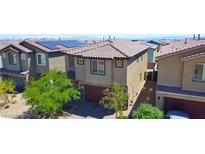 Beautiful two-story home featuring a tile roof, solar panels, and a spacious two-car garage at 8324 S Miller Ln, Las Vegas, NV 89113