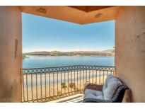 Enjoy stunning lake views from this inviting balcony with seating area at 20 Via Mantova # 306, Henderson, NV 89011