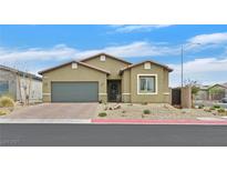 Charming single-story home with a well-maintained front yard and a two-car garage at 7910 Pearly Ct, North Las Vegas, NV 89084