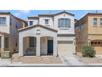 Charming two-story home with attached garage and covered front porch at 1316 Oak Village Ave, Las Vegas, NV 89183