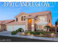 Charming two-story home featuring a well-manicured yard and gated entrance at 3950 Candleglow Ct, Las Vegas, NV 89147