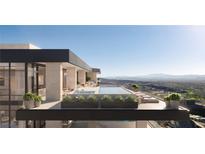 Modern rooftop pool and lounge area with stunning views at 400 Rock Peak Dr # 2402, Henderson, NV 89012
