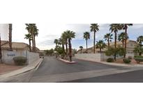 Community street view featuring desert landscaping and block wall at 1401 at 1401 N Michael Way # 244, Las Vegas, NV 89108